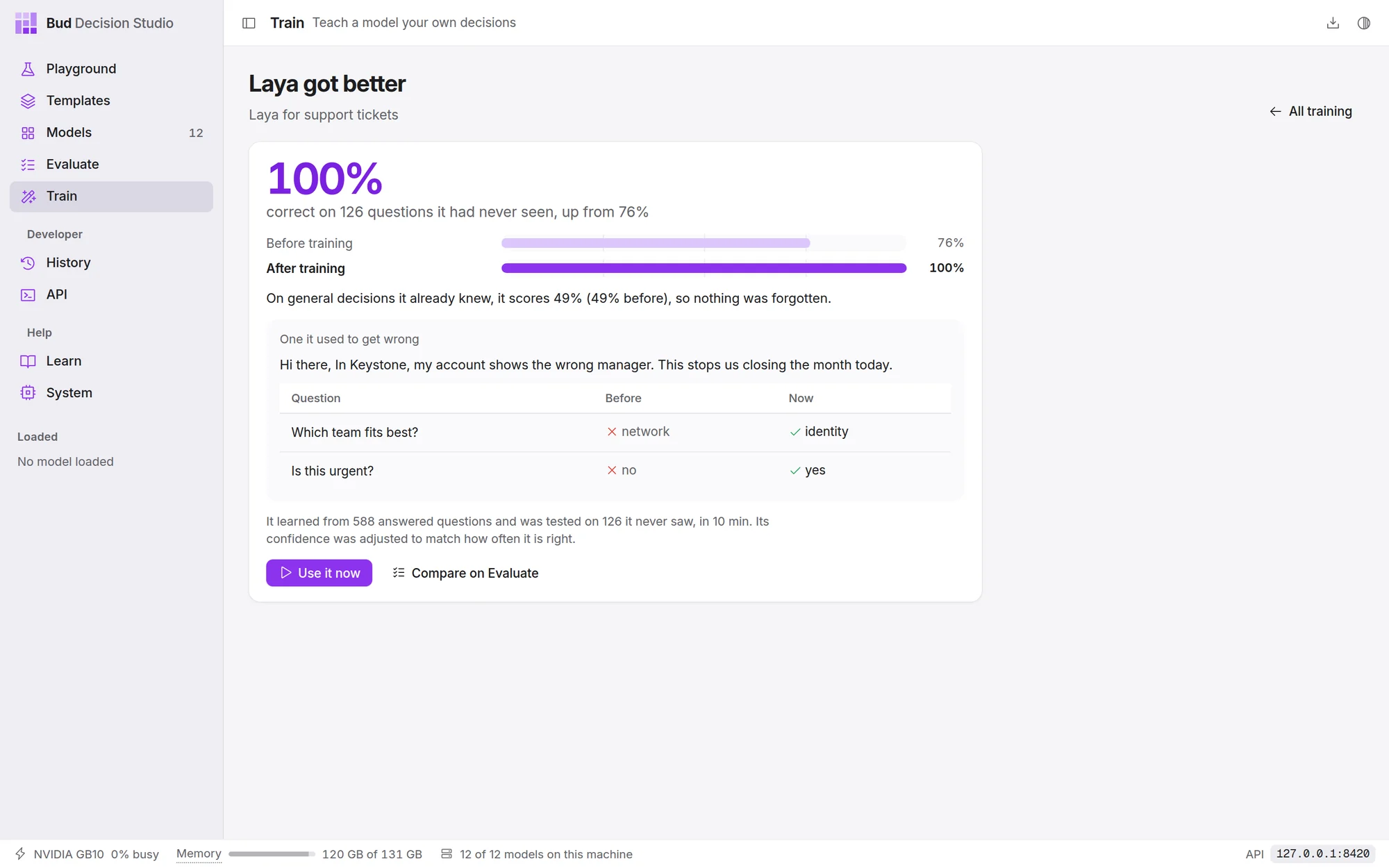 Training summary screen showing 100% accuracy on held-out examples, confusion matrix, and general retention scores.